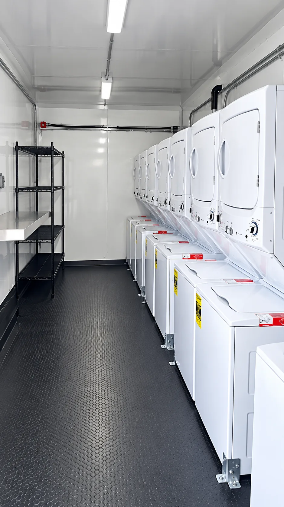 Commercial laundry trailer with multiple washers and dryers