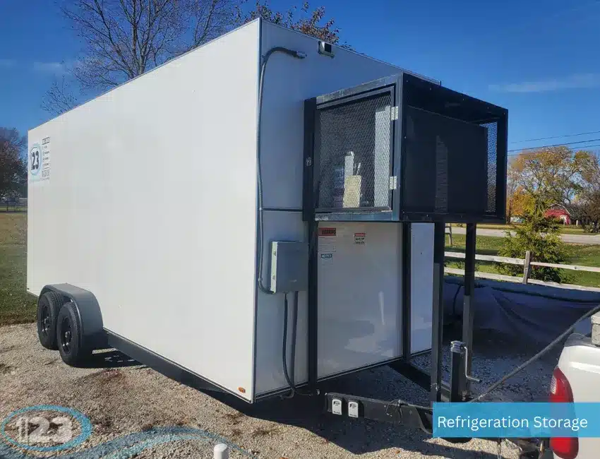 Refrigerated trailer with front-mounted cooling unit